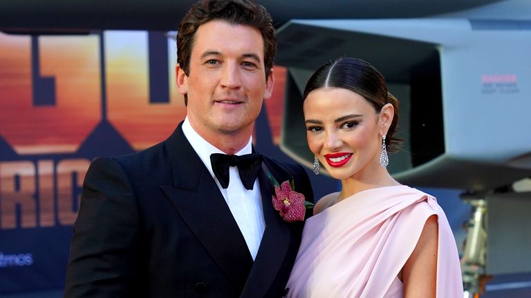 Miles Teller and Keleigh Sperry attending the UK premiere of Top Gun: Maverick at the Odeon Leicester Square, central London. Picture date: Thursday May 19, 2022.
