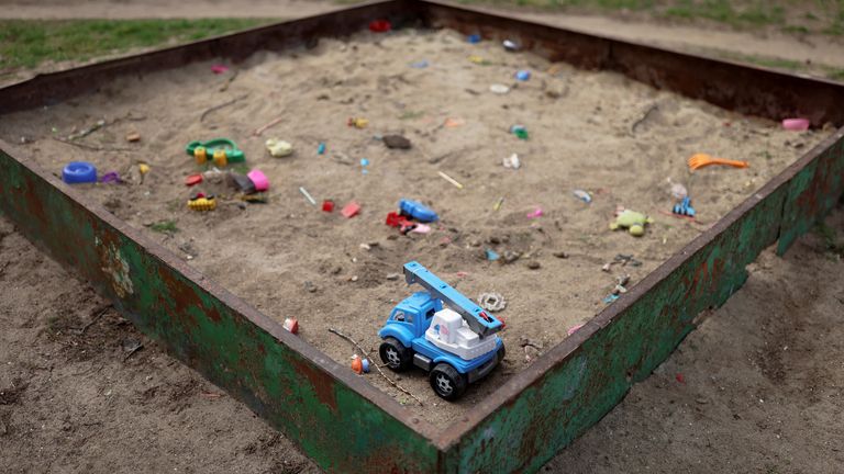 Children&#39;s toys are seen in a sandpit after a military strike hit a neighbourhood, as Russia&#39;s invasion of Ukraine continues, in Mykolaiv, Ukraine, March 31, 2022. REUTERS/Nacho Doce