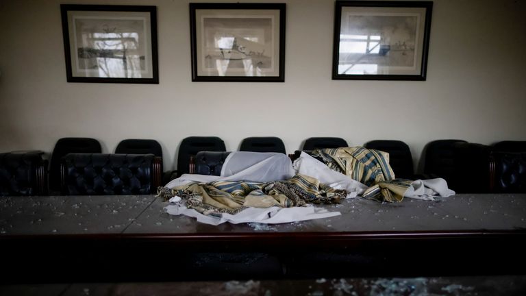 A view of a meeting room inside a destroyed Ukrainian government administration building following shelling, amid Russia&#39;s invasion on Ukraine, in Mykolaiv, Ukraine, April 8, 2022. REUTERS/Ueslei Marcelino