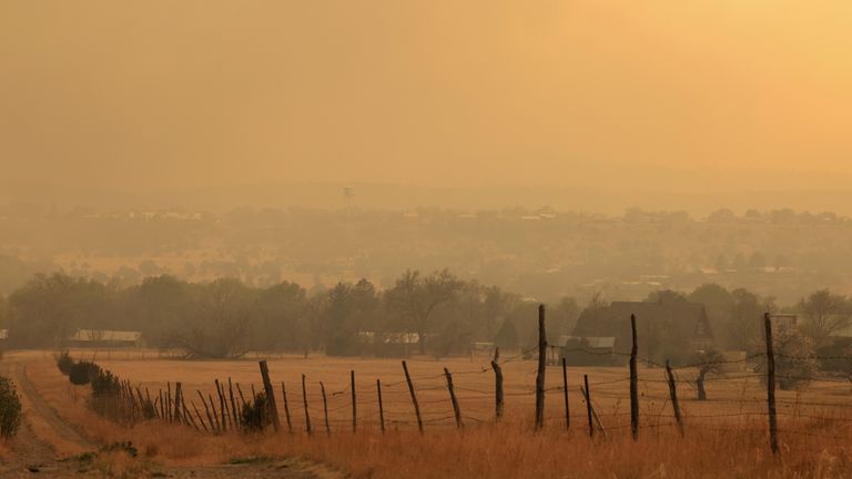 Smoke clouds nearby Hermits Peak and Calf Canyon wildfires in Las Vegas, New Mexico