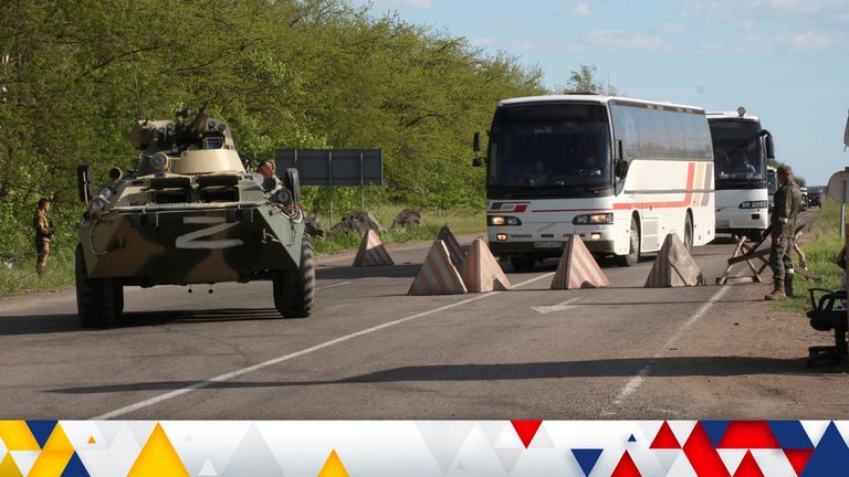 Buses with Ukrainian servicemen evacuated from the besieged Mariupol&#39;s Azovstal steel plant travel accompanied by Russian APC&#39;s to a prison in Olyonivka, territory under the government of the Donetsk People&#39;s Republic, eastern Ukraine, Tuesday, May 17, 2022. Pic: AP