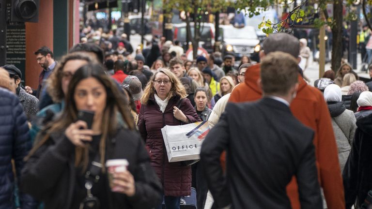 Shoppers on Oxford Street in London, on Black Friday. Picture date: Friday November 26, 2021.