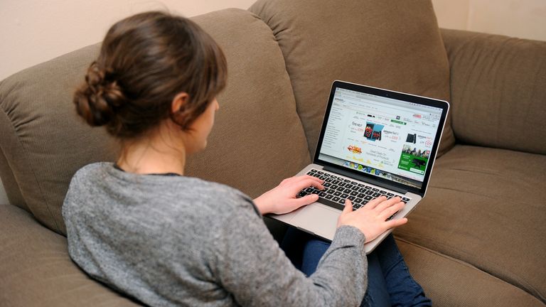 THURSDAY May 1 File photo of a woman using a laptop computer.  The public and businesses need "remove the password completely" and turn to other technology to protect personal information from hackers, a cybersecurity expert said.  Marking World Password Day on Thursday, Grahame Williams, director of identity and access management at defense firm Thales, said passwords were "becoming more and more unsafe" and "easy to hack".  Release date: Thursday, May 5, 2022.