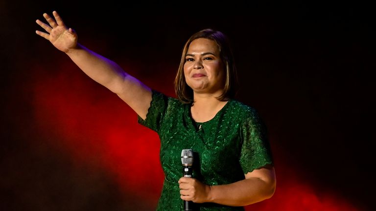 Vice-presidential candidate Sara Duterte-Carpio, daughter of Philippine President Rodrigo Duterte, waves to her supporters during the first day of campaign period for the 2022 presidential election, at the Philippine Arena, in Bocaue, Bulacan province, Philippines, February 8, 2022 REUTERS / Lisa Marie David