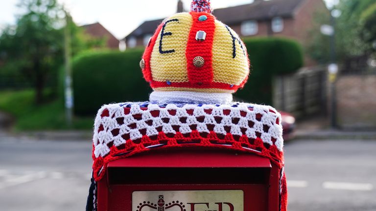 Post boxes in the village of Twyning in Worcestershire which have been decorated with woolen crowns to mark the Queen&#39;s Platinum Jubilee. Picture date: Tuesday May 31, 2022.