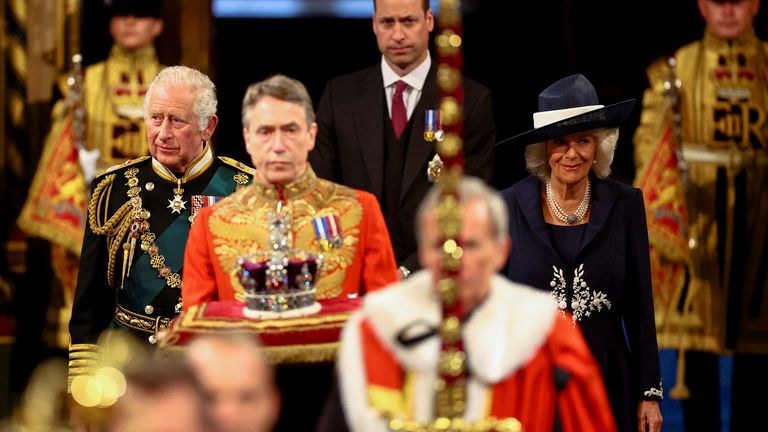 Britain&#39;s Prince Charles, Camilla, Duchess of Cornwall, and Prince William proceed behind the Imperial State Crown through the Royal Gallery for the State Opening of Parliament at the Palace of Westminster in London, Britain, May 10, 2022. REUTERS/Hannah McKay/Pool

