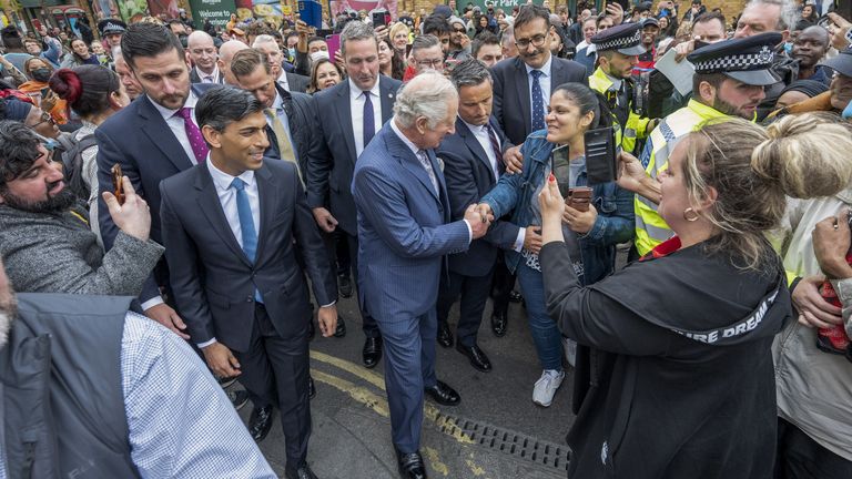 The Prince of Wales, accompanied by Chancellor Rishi Sunak meeting the public in Walworth, London, during a visit to a JD Sports store to meet with young people supported by The Prince&#39;s Trust through the UK Government&#39;s Kickstart Scheme. Picture date: Wednesday May 11, 2022.
