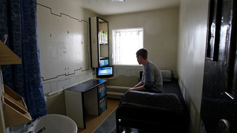 A prisoner sits in his cell on the resettlement wing in Doncaster Prison, northern England, December 13, 2011. Burglary at 15 earned him his first sentence and began a cycle of crime to fund a heroin addiction - a cycle he is now determined to end with the help of a pilot prison scheme. "You used to come to jail and if you didn&#39;t have probation work when you got out of there you were on your own," Shane, now 32, told Reuters in an empty canteen at Doncaster prison in south Yorkshire, England. " 