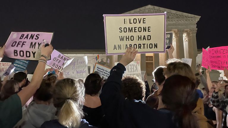 Protestors react outside the U.S. Supreme Court to the leak of a draft majority opinion written by Justice Samuel Alito preparing for a majority of the court to overturn the landmark Roe v. Wade abortion rights decision later this year, in Washington, U.S., May 2, 2022. REUTERS/Moira Warburton
