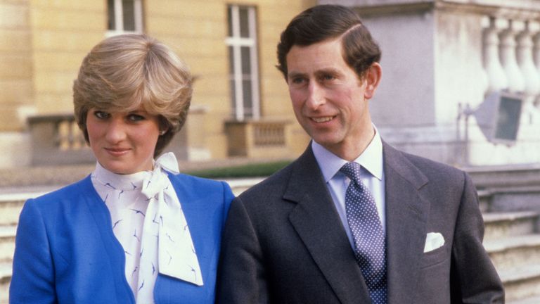 Prince Charles and Lady Diana Spencer (wearing the diamond and sapphire engagement ring he gave her) looking affectionate in the grounds of Buckingham Palace after the announcement of their engagement in London on Feb. 24, 1981.