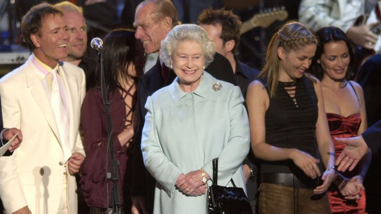 The Queen alongside Sir Cliff Richard at the Golden Jubilee Party at the Palace in June 2002