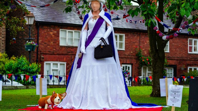 A life-size queen and corgi are knitting in the village of Sherlock Holmes, Cheshire, ahead of the Platinum Jubilee. Image Date: Tuesday, May 31, 2022.