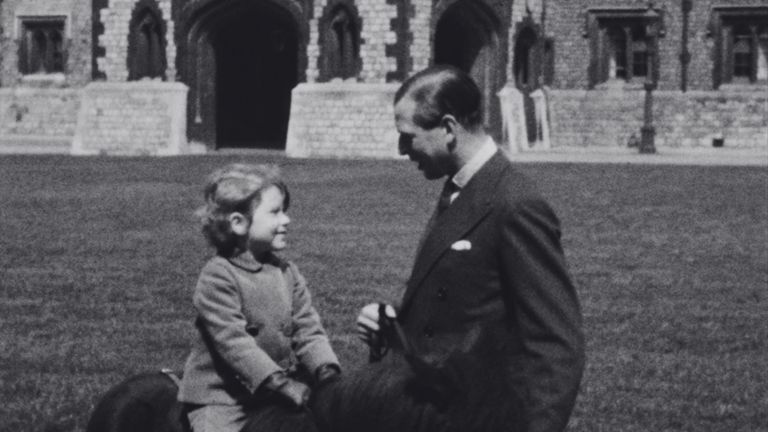 Princess Elizabeth is seen with her uncle Prince George the Duke of Kent at Windsor Castle in 1930