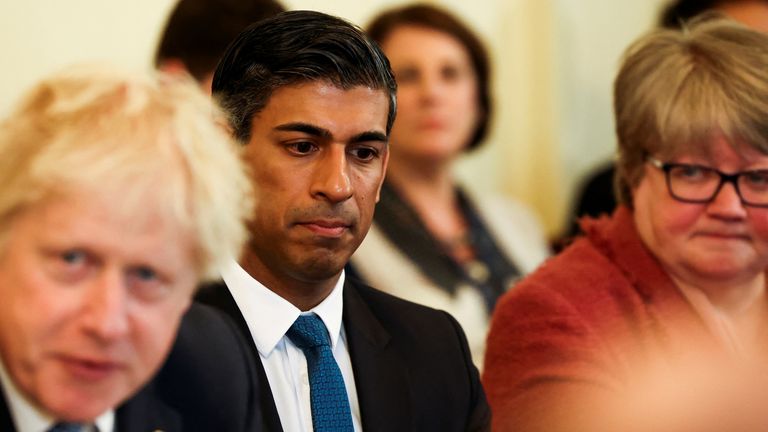 British Chancellor of the Exchequer Rishi Sunak listens as Britain&#39;s Prime Minister Boris Johnson speaks, at the weekly cabinet meeting at Downing Street, London, Britain May 17, 2022. REUTERS/Henry Nicholls/Pool
