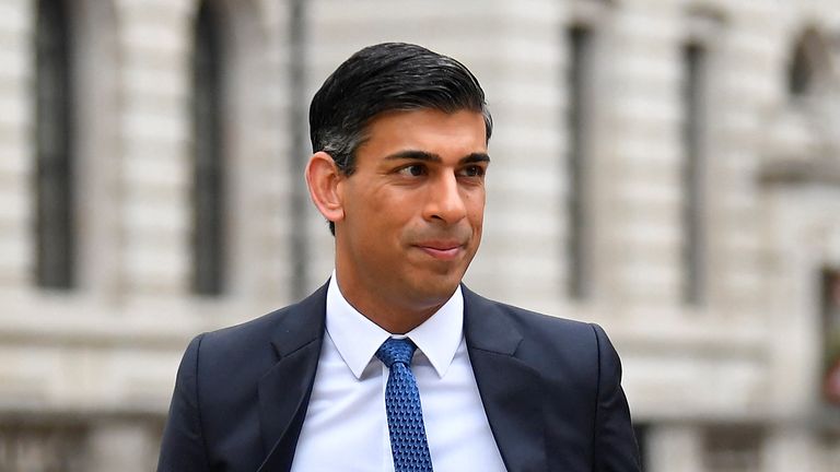 British Chancellor of the Exchequer Rishi Sunak walks near the Treasury building in London, Britain, May 3, 2022. REUTERS/Toby Melville
