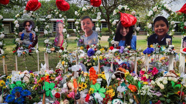 Flowers, toys, and other objects to remember the victims of the deadliest U.S. school mass shooting in nearly a decade, resulting in the death of 19 children and two teachers, are pictured at the Robb Elementary School in Uvalde, Texas, U.S., May 30, 2022. REUTERS/Veronica G. Cardenas
