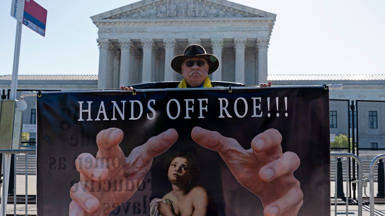Abortion rights activist protests outside of the U.S. Supreme Court, Wednesday, May 11, 2022 in Washington. A draft opinion suggests the U.S. Supreme Court could be poised to overturn the landmark 1973 Roe v. Wade case that legalized abortion nationwide, according to a Politico report. (AP Photo/Jose Luis Magana)
