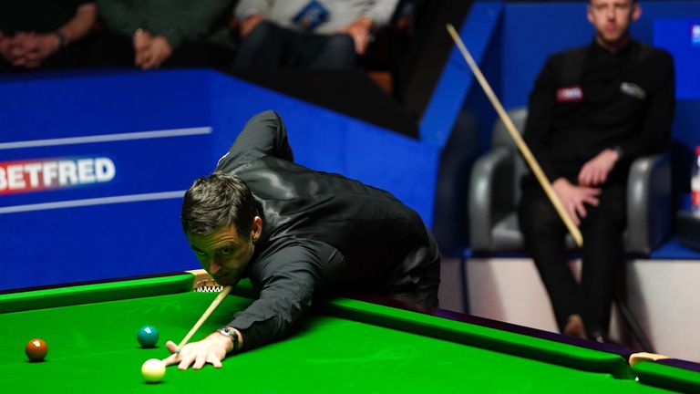 England&#39;s Ronnie O&#39;Sullivan in action against England&#39;s Judd Trump during day sixteen of the Betfred World Snooker Championship at The Crucible, Sheffield. Picture date: Sunday May 1, 2022.