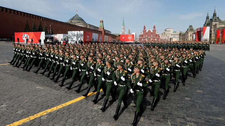 Russian service members take part in a rehearsal for the Victory Day military parade in Moscow