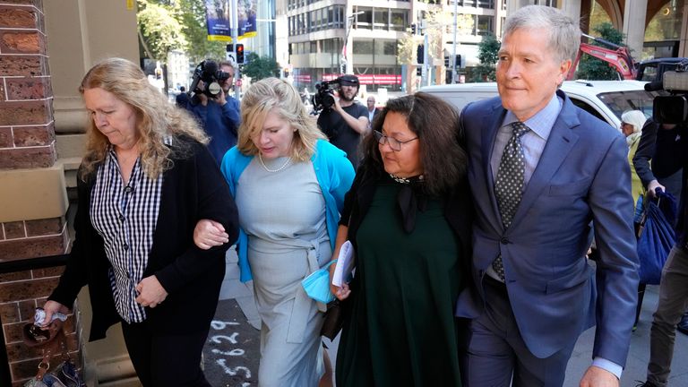 The brother of murder victim Scott Johnson, Steve Johnson (right), with his sisters, Terry (left) and Rebecca with his wife Rosemarie (second right).  Photo: AP