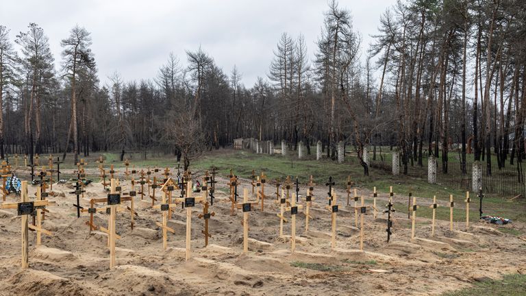 A new cemetery near a local church is pictured in the town of Severodonetsk, Luhansk region, Ukraine, April 14, 2022. REUTERS/Marko Djurica