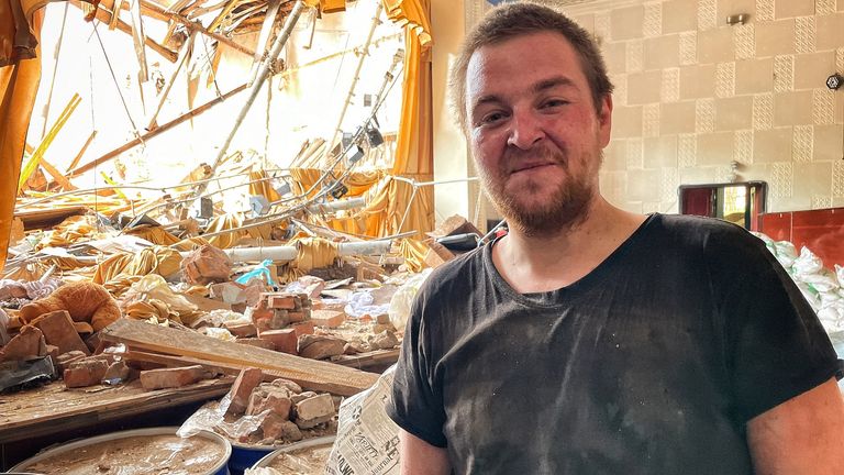 Oleksiy Kovalyov stands in the debris of what was once Soledar’s theatre and cultural Center. Pic: Chris Cunningham