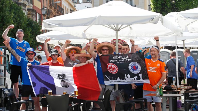 Glasgow Rangers supporters cheer outside a bar in downtown Seville, Spain as they look forward to the final. Pic: AP