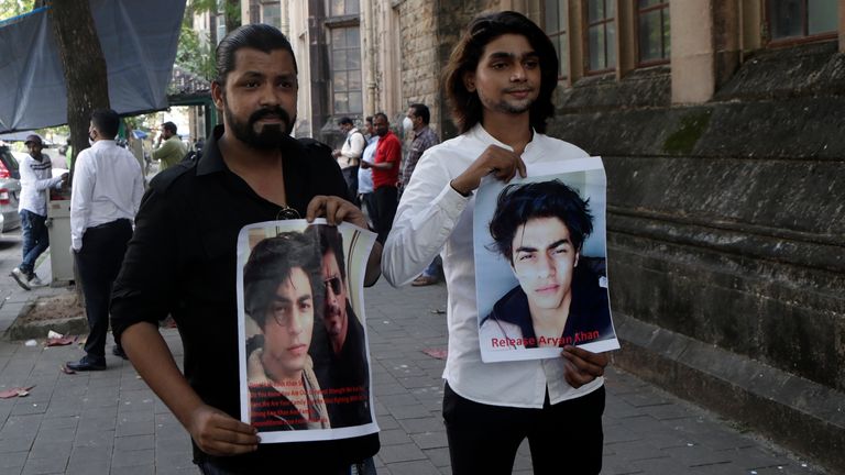 Fans with posters calling for the release of Aryan Khan last October. File pic - AP