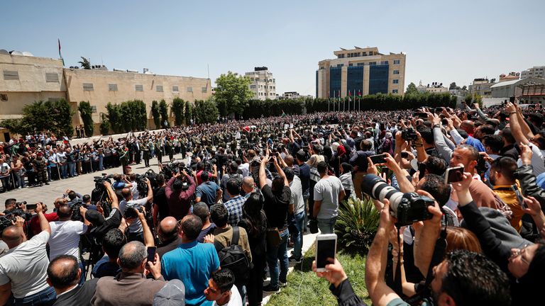 Palestinians bid farewell to Al Jazeera journalist Shireen Abu Akleh, who was killed during an Israeli raid, in Ramallah in the Israeli-occupied West Bank May 12, 2022. REUTERS/Mohamad Torokman
