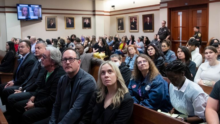 Spectators in court look at monitors in the courtroom in the Fairfax County Circuit Courthouse in Fairfax, Va., Thursday, May 26, 2022. Actor Johnny Depp sued his ex-wife Amber Heard for libel in Fairfax County Circuit Court after she wrote an op-ed piece in The Washington Post in 2018 referring to herself as a "public figure representing domestic abuse." (Michael Reynolds/Pool Photo via AP)
PIC:AP