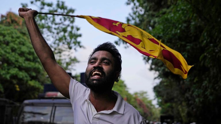 A protestor shouts slogans outside parliament during a countrywide strike in Colombo, Sri Lanka, Friday, May 6, 2022. Protesters have hung undergarments near Sri Lanka’s Parliament while shops, offices and schools closed and transport came to a near standstill amid nationwide demonstrations against the government over its alleged inability to resolve the worst economic crisis in decades. (AP Photo/Eranga Jayawardena)


