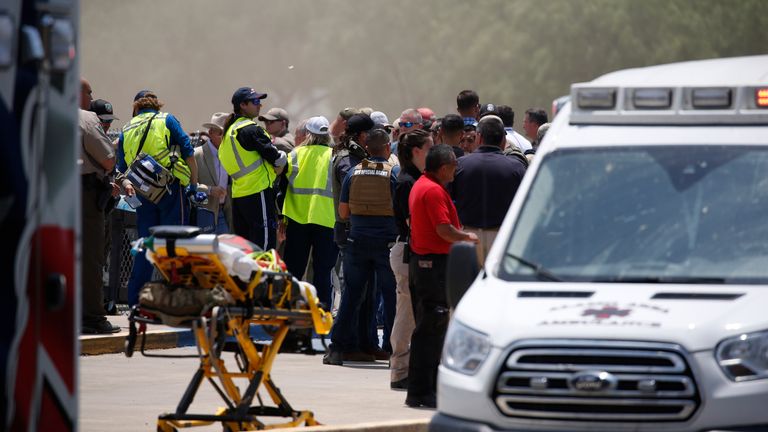 Emergency personnel gather near Robb Elementary School. Pic: AP