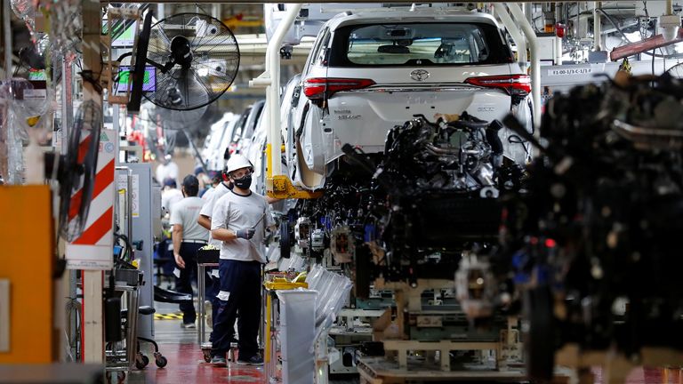 Employees work at the Toyota assembly plant in Zarate, on the outskirts of Buenos Aires, Argentina March 15, 2021. REUTERS/Agustin Marcarian