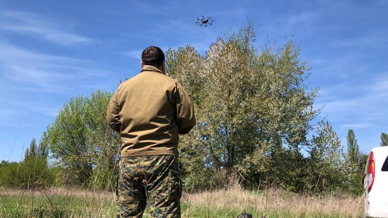 Vadym with his drone with eight helicopter-style blades
