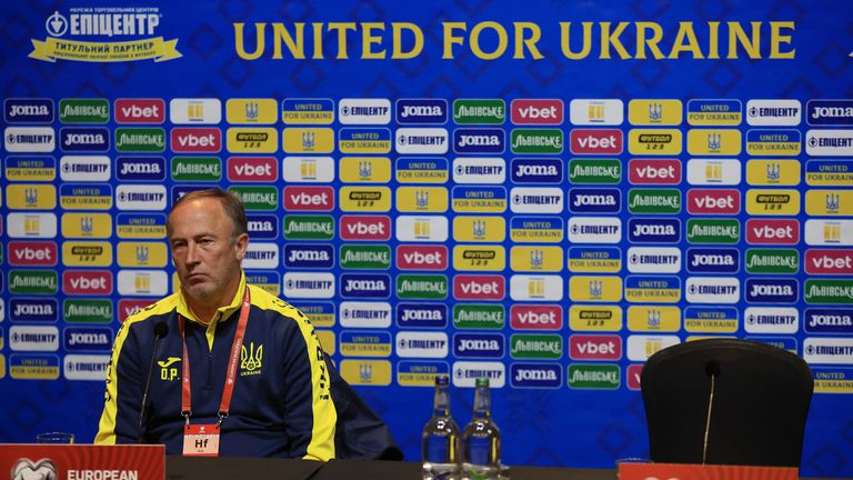 Soccer Football - FIFA World Cup - UEFA Qualifiers - Ukraine Press Conference - Hampden Park, Glasgow, Scotland, Britain - May 31, 2022 Ukraine coach Oleksandr Petrakov after Oleksandr Zinchenko left the press conference Action Images via Reuters/Lee Smith
