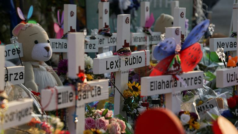 Flowers, toys, and other objects to remember the victims of the deadliest U.S. school mass shooting resulting in the death of 19 children and two teachers, are seen at a memorial at Robb Elementary School in Uvalde, Texas, U.S. May 30, 2022. Picture taken May 30, 2022. REUTERS/Veronica G. Cardenas
