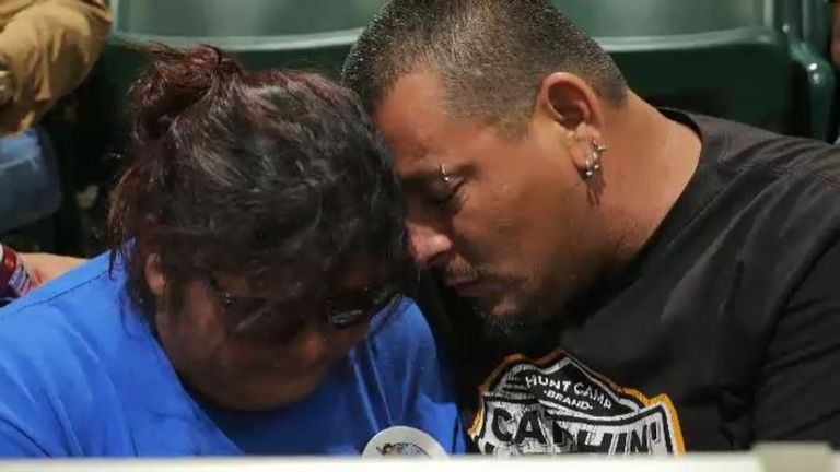 People mourn the victims of the school shooting in Uvalde, Texas