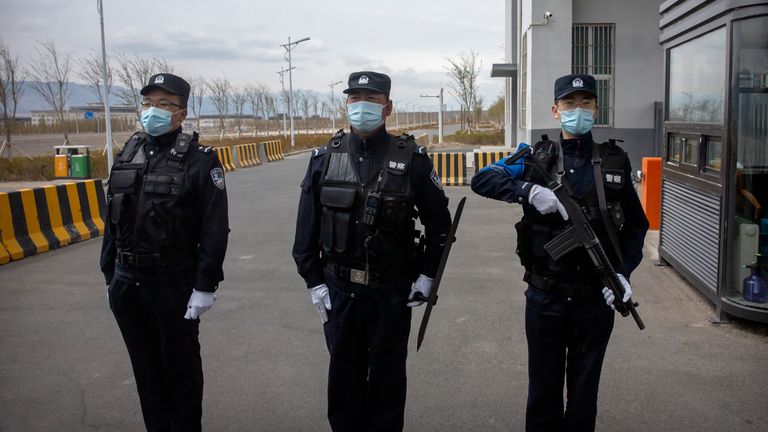 Police at the entrance of the Urumqi number three detention centre in Dabancheng in western China&#39;s Xinjiang Uyghur autonomous region. Pic: AP
