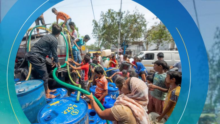 Women and children clamour for water in New Delhi in June 2021