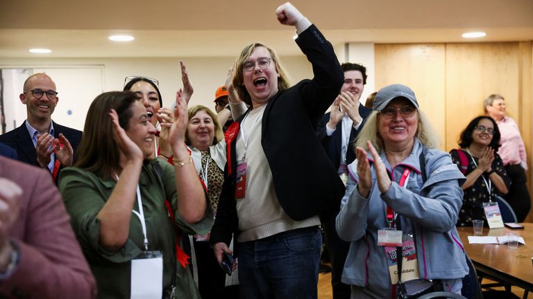 British Labour Party candidates and supporters celebrate after the Labour gain of Westminster City Council during local elections, at Lindley Hall in Westminster, London, Britain May 6, 2022. REUTERS/Henry Nicholls
