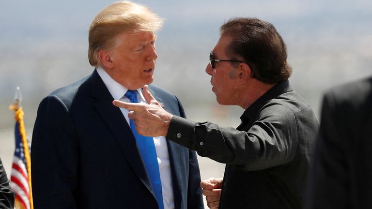FILE PHOTO: U.S. President Donald Trump speaks with casino developer Steve Wynn as Trump departs Las Vegas, Nevada, U.S., April 6, 2019. REUTERS/Kevin Lamarque/File Photo