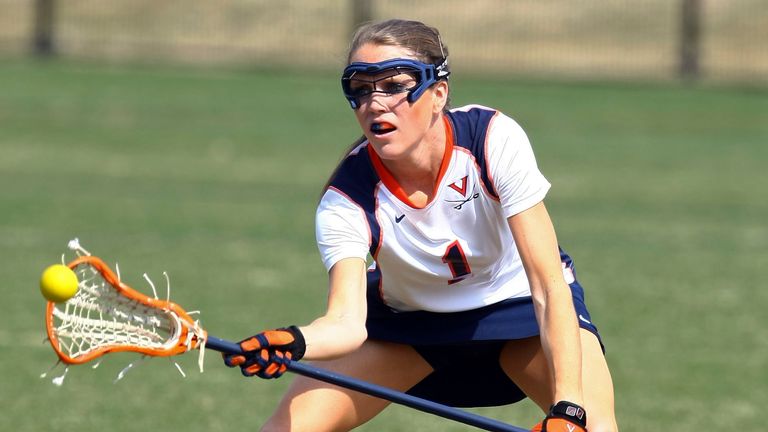 In a March 8, 2009, photo,  University of Virginia women...s lacrosse player Yeardley Love works with the ball. George Huguely, a Virginia men&#39;s lacrosse player, has been charged with first-degree murder in the death of Love, police said Monday, May 3, 2010. (AP Photo/The Daily Progress, Andrew Shurtleff)