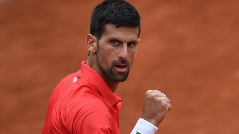Serbia&#39;s Novak Djokovic reacts after winning against Diego Schwartzman during their men&#39;s singles match on day eight of the Roland-Garros Open tennis tournament at the Court Suzanne-Lenglen in Paris on May 29, 2022. (Photo by JULIEN DE ROSA / AFP) (Photo by JULIEN DE ROSA/AFP via Getty Images)
