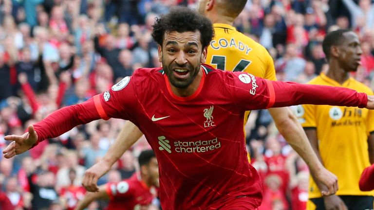 Mo Salah celebrates after giving Liverpool the lead against Wolves