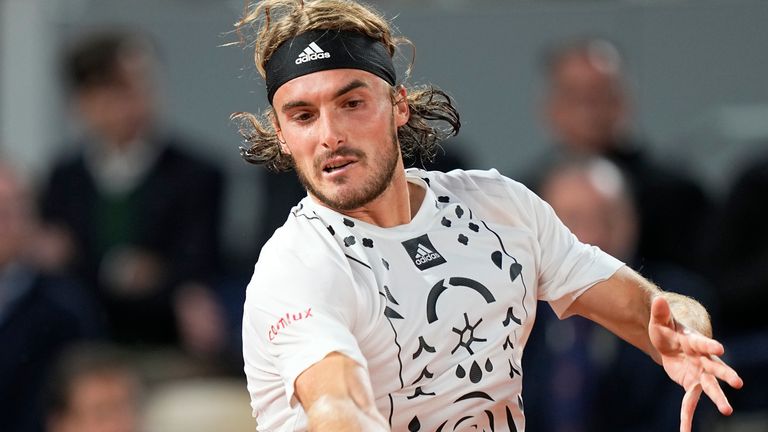 Greece&#39;s Stefanos Tsitsipas returns the ball to Italy&#39;s Lorenzo Musetti during their first round match of the French Open tennis tournament at the Roland Garros stadium Tuesday, May 24, 2022 in Paris. (AP Photo/Michel Euler)