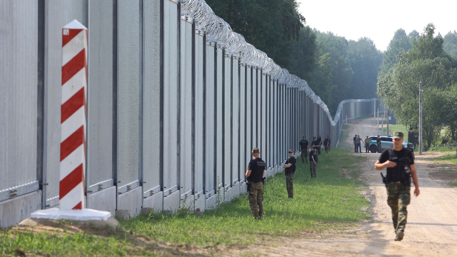 ‘Double Standards’: Poland Criticised As Steel Wall Along Border With Belarus Is Completed