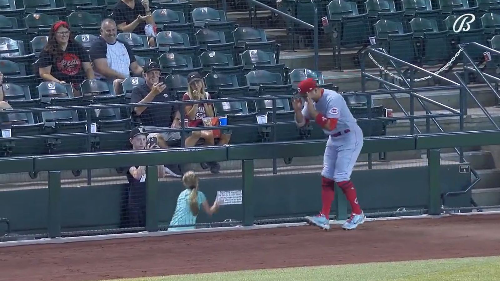 Baseball star Joey Votto performs 'Griddy dance' with young fan after she holds up sign saying
