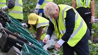 Prime Minister Boris Johnson works with pickers to harvest courgettes during a visit to Southern England Farms Ltd in Hayle, Cornwall, ahead of the publication of the UK government&#39;s food strategy white paper, Cornwall. Picture date: Monday June 13, 2022.

