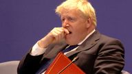 Prime Minister Boris Johnson yawns as he attends the Leaders&#39; Retreat executive session on the sidelines of the 2022 Commonwealth heads of Government meeting in Kigali, Rwanda