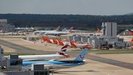 FILE PHOTO: British Airways, Easyjet and TUI aircraft are parked at the South Terminal at Gatwick Airport, in Crawley, Britain, August 25, 2021. REUTERS/Peter Nicholls/File Photo